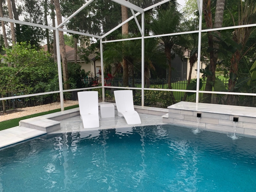 Rock waterfall to scupper wall + loungers — after, view 2