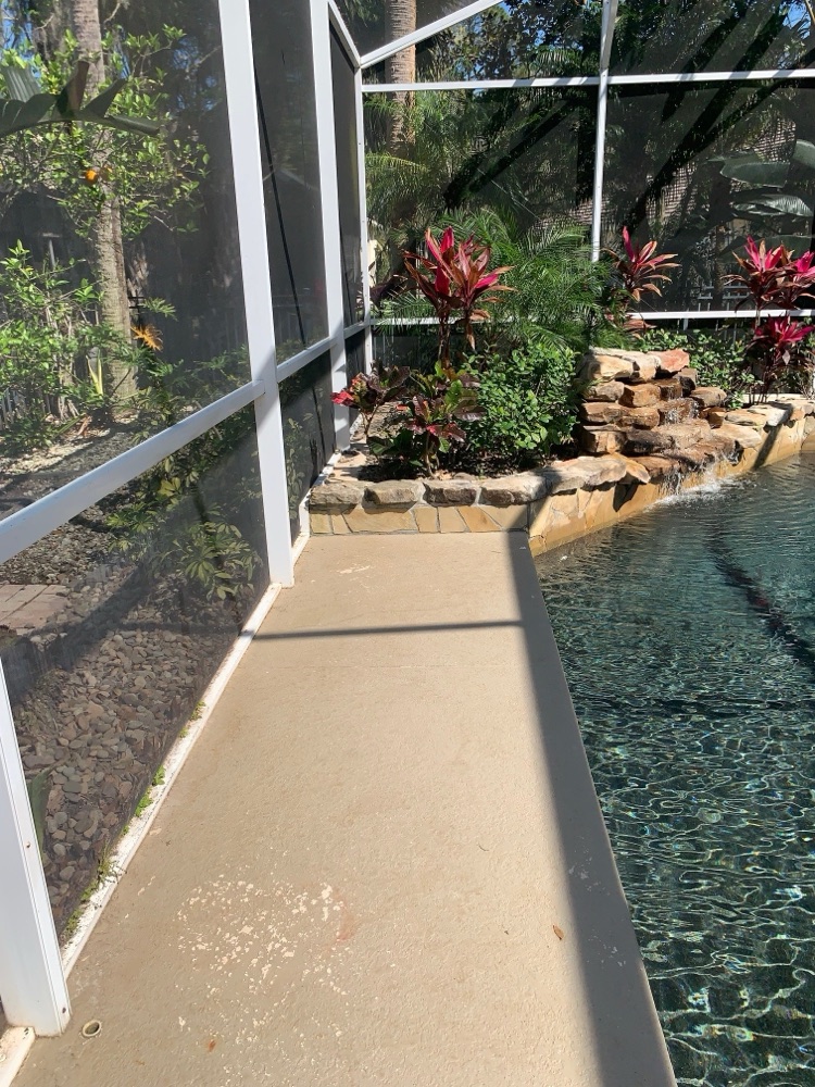 Rock waterfall to scupper wall + loungers — before, view 2