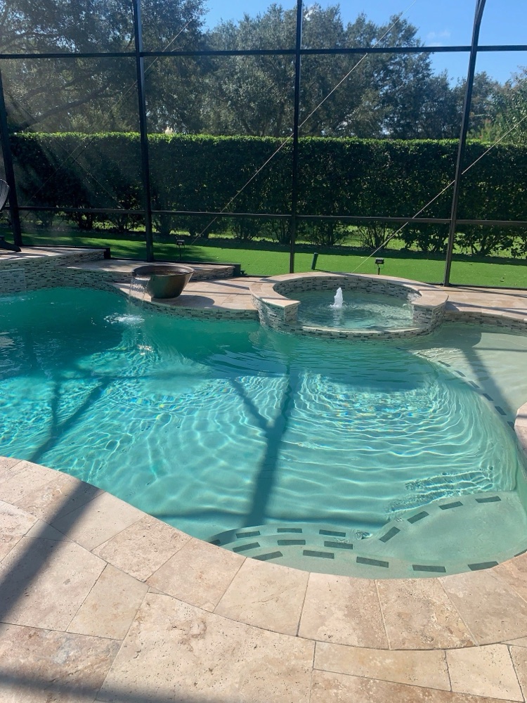 Full reshape + glass-tile spa — before, view 1