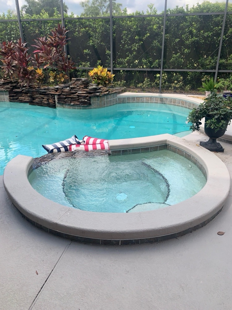 Full reshape + glass-tile spa — before, view 2